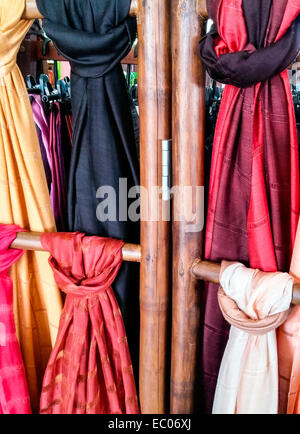 Colorful silk shawls in the Thai gift shop. Stock Photo