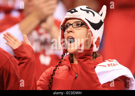 Indianapolis, IN, USA. 06th Dec, 2014. A Wisconsin fan cheers for the Badgers during the first half of the NCAA Big 10 Championship football game between the Wisconsin Badgers and the Ohio State Buckeyes at Lucas Oil Stadium in Indianapolis, Indiana. Credit: 2014 Billy Hurst/CSM/Alamy Live News Stock Photo