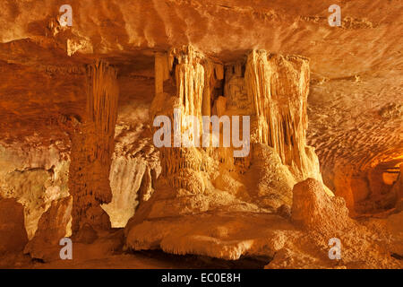 Immense stalactites and stalagmites linking roof and floor of vast cavern in Abercrombie caves system in NSW Australia Stock Photo