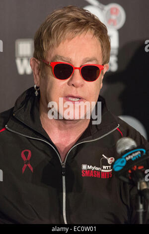 London, UK. 7 December 2014. Pictured: rock star Sir Elton John and leader of the Team Elton. Press conference led by Billie Jean King and Sir Elton John ahead of the tennis matches of the 22nd Mylan World Team Tennis Smash Hits at the Royal Albert Hall, London. Event participants include Andy Roddick, Tim Henman, Kim Clijsters, Sabine Lisicki, John McEnroe, Jamie Murray, Heather Watson and Martina Hingis. The event raises money for the Elton John Aids Foundation (EJAF). The event takes place during Statoil Masters Tennis. Credit:  Nick Savage/Alamy Live News Stock Photo