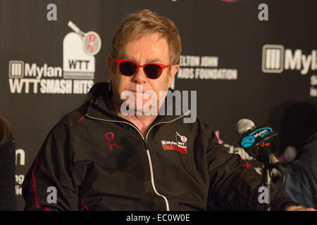 London, UK. 7 December 2014. Pictured: rock star Sir Elton John and leader of the Team Elton. Press conference led by Billie Jean King and Sir Elton John ahead of the tennis matches of the 22nd Mylan World Team Tennis Smash Hits at the Royal Albert Hall, London. Event participants include Andy Roddick, Tim Henman, Kim Clijsters, Sabine Lisicki, John McEnroe, Jamie Murray, Heather Watson and Martina Hingis. The event raises money for the Elton John Aids Foundation (EJAF). The event takes place during Statoil Masters Tennis. Credit:  Nick Savage/Alamy Live News Stock Photo