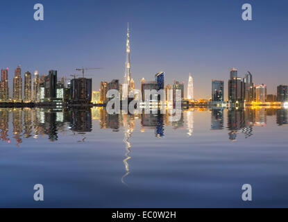 Evening skyline view of Burj Khalifa and Dubai from Business Bay district in United Arab Emirates Stock Photo