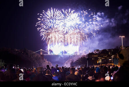 Bristol, UK. 7th Dec, 2014. Isambard Kingdom Brunel's Clifton Suspension Bridge marks the 150th anniversary of its opening with an elaborate fireworks display. Thousands of people lined the streets of Bristol to watch the event. The display was preceded by a one minute silence in memory of Charlotte Bevan and her daughter Zaani, whose bodies were discovered near the bridge earlier this week. Credit:  Adam Gasson/Alamy Live News Stock Photo