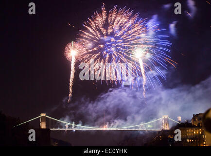 Bristol, UK. 7th Dec, 2014. Isambard Kingdom Brunel's Clifton Suspension Bridge marks the 150th anniversary of its opening with an elaborate fireworks display. Thousands of people lined the streets of Bristol to watch the event. The display was preceded by a one minute silence in memory of Charlotte Bevan and her daughter Zaani, whose bodies were discovered near the bridge earlier this week. Credit:  Adam Gasson/Alamy Live News Stock Photo