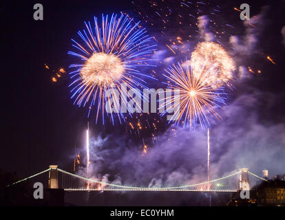 Bristol, UK. 7th Dec, 2014. Isambard Kingdom Brunel's Clifton Suspension Bridge marks the 150th anniversary of its opening with an elaborate fireworks display. Thousands of people lined the streets of Bristol to watch the event. The display was preceded by a one minute silence in memory of Charlotte Bevan and her daughter Zaani, whose bodies were discovered near the bridge earlier this week. Credit:  Adam Gasson/Alamy Live News Stock Photo