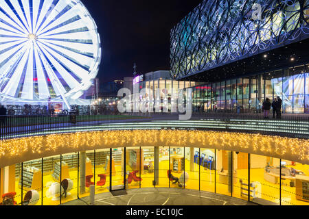 The library of Birmingham in Centenary Square, Birmingham, England, and ferris wheel. Stock Photo