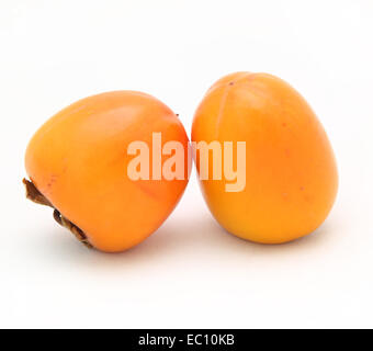 two persimmon on a white background Stock Photo