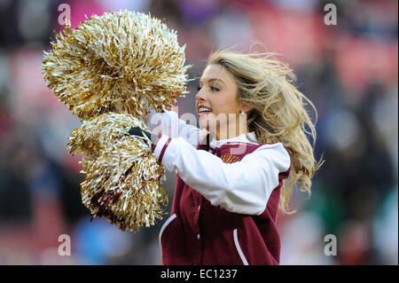 Landover, Maryland, USA. 07th Dec, 2014. A Washington Redskins cheerleader performs during the matchup between the St. Louis Rams and the Washington Redskins at FedEx Field in Landover, MD. Credit:  Cal Sport Media/Alamy Live News Stock Photo