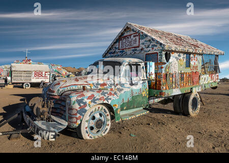 A truck decorated by folk artist Leonard Knight at the Salvation Mountain religious folk art site near Niland California Stock Photo