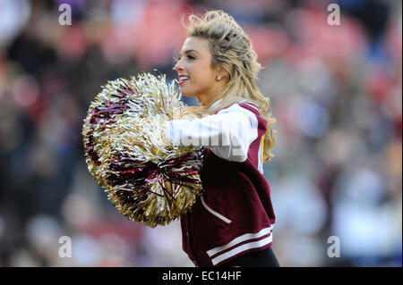Landover, Maryland, USA. 07th Dec, 2014. A Washington Redskins cheerleader performs during the matchup between the St. Louis Rams and the Washington Redskins at FedEx Field in Landover, MD. Credit:  Cal Sport Media/Alamy Live News Stock Photo