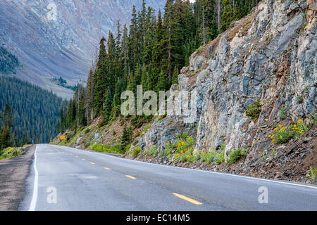 US 6 Loveland Pass in Colorado showing the steepness of the road and the dramatic mountainside in the background Stock Photo