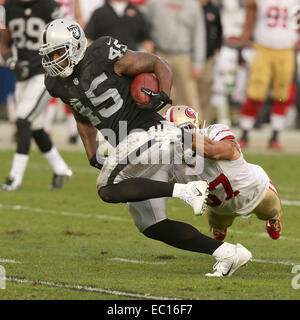 Oakland, California, USA. 7th Dec, 1980. Oakland Raiders vs Dallas Cowboys  at Oakland-Alameda County Coliseum Sunday, December 7, 1980 Oakland Running  back Mark Van Eeghen pushes for extra yardage. Raiders lost to