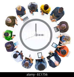 Multiethnic People Using Digital Devices with Clock Symbol Stock Photo