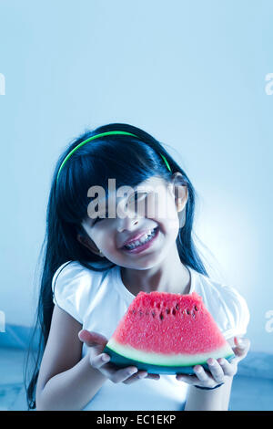 indian Beautiful child Eating  Water Melon Stock Photo