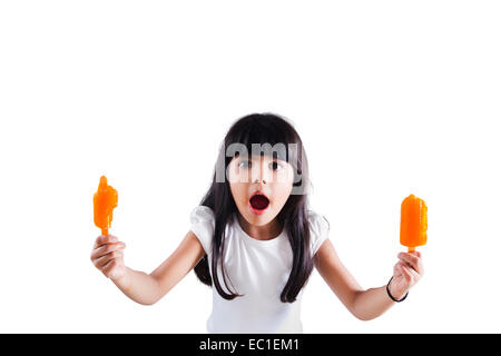 indian Beautiful child Eating Ice Cream Stock Photo