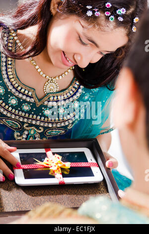 2 indian Children Festival Raksha Bandhan  Surprise Gift Stock Photo