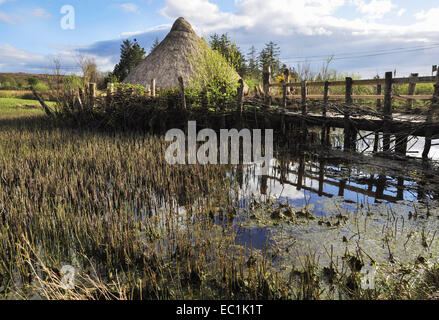 Irish Crann—g in lake, accessed only by causeway or dug-out boat, for protection; reconstructed at Connemara, Co. Galway Stock Photo