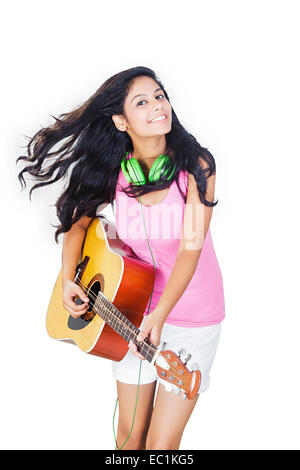 indian Beautiful girl Singing Guitar Stock Photo