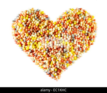 Heart shape made from 100's and 1000's sugar balls. Stock Photo