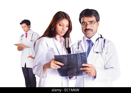 two indian Doctor Discuss X-Ray Report Stock Photo