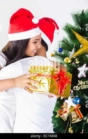 indian couple Christmas Festival Surprise gift Stock Photo