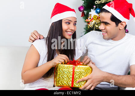 indian couple Christmas Festival surprise gift Stock Photo