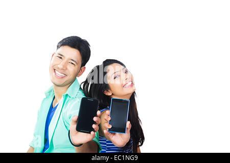 indian college couple talking phone Stock Photo