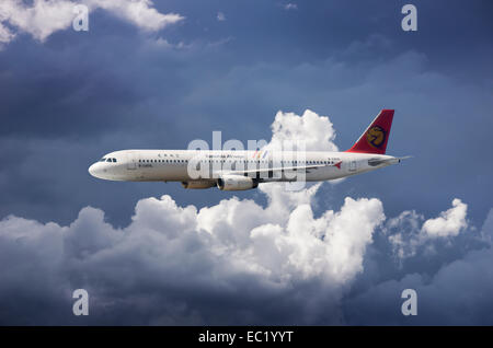 B-22605, TransAsia Airways, Airbus A321-131 in flight in bad weather Stock Photo