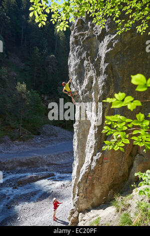 Sport climber climbing a rock face, Ehnbachklamm gorge, Zirl, Tyrol, Austria Stock Photo
