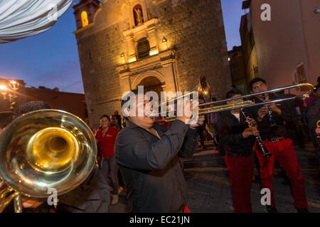 Mexican musicians parade through the streets during the Day of the Dead Festival known in spanish as D’a de Muertos on October 30, 2014 in Oaxaca, Mexico. Stock Photo