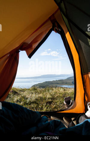 View from inside tent looking across Sound of Raasay, Isle of Skye, Scotland, United Kingdom Stock Photo