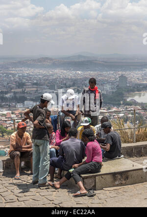 A group of youths with a view over Antananarivo Madagascar Stock Photo