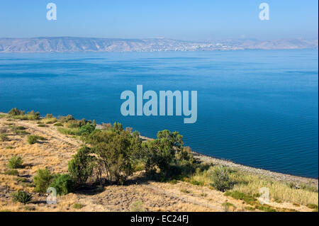 The sea of Galilee in Israel as seen from the east coast, the city on the other side is Tiberias Stock Photo