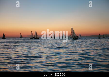 Trieste, Italy - October 12, 2013: Sailing by night during Barcolana race in Trieste Stock Photo