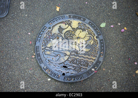 Decorative manhole covers in Japan. Stock Photo