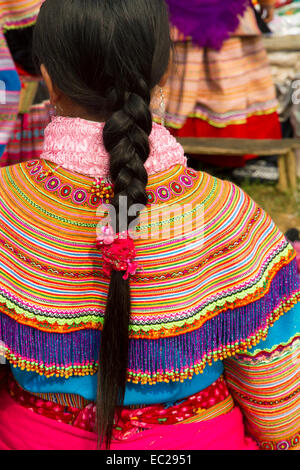 A Flower Hmong dress and hair at Bac Ha morning market Stock Photo
