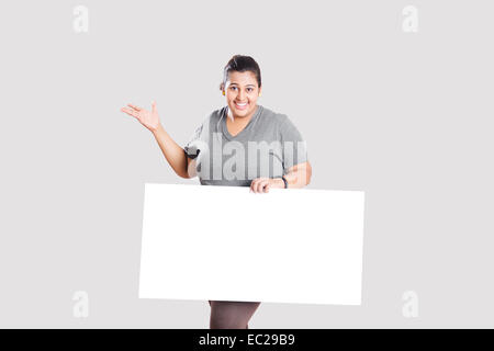 indian Obese  Lady Showing Message Board Stock Photo