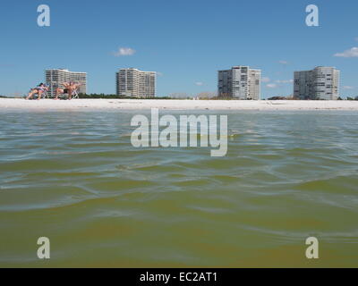 View of condos from water perspective on Tigertail Beach, Marco Island, Florida, USA, October 9, 2014, © Katharine Andriotis Stock Photo