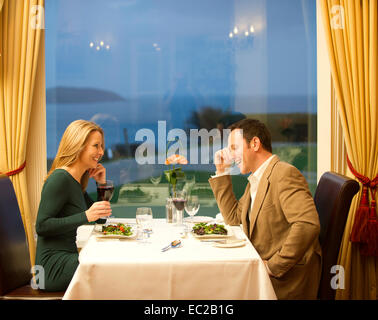 A couple having a romantic evening meal Stock Photo