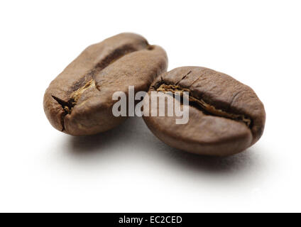 Two brown coffee beans on white Stock Photo