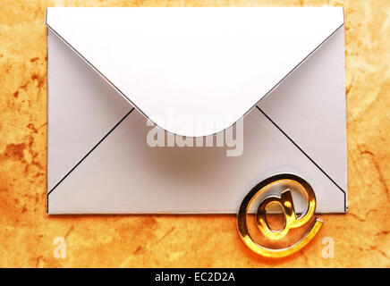 Email international sign on blank envelope Stock Photo