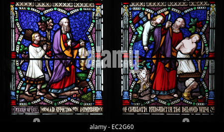 A stained glass window by William Wailes depicting Abraham and his son Isaac, St Bartholomew Church, Richard's Castle, Herefords Stock Photo