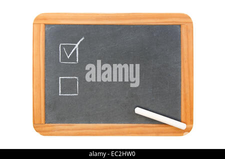 Two checkboxes on on vintage chalkboard and used chalk on the board, isolated on white Stock Photo