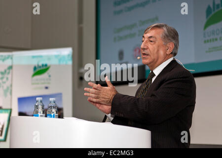 Copenhagen, Denmark. 8th December, 2014. Mr. Karmenu Vella, EU Commissioner for the Environmental, pictured at his speech during  the European Green Capital meeting in Copenhagen. Copenhagen was by the EU awarded European Green Capital 2014 and at this ceremony the city handover the award to the Mayor of Bristol Credit:  OJPHOTOS/Alamy Live News Stock Photo