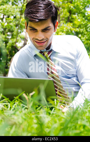 indian Business Man park laptop working Stock Photo