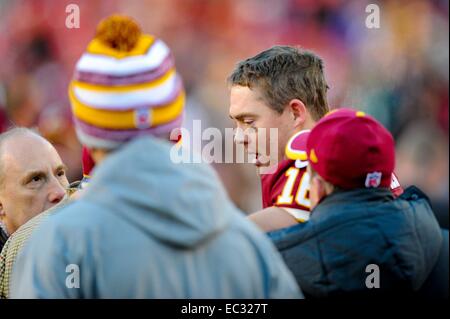 DEC 07, 2014 : Washington Redskins quarterback Colt McCoy (16) gets evaluated on the sideline late in the fourth during the matchup between the St. Louis Rams and the Washington Redskins at FedEx Field in Landover, MD. Stock Photo