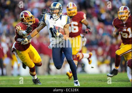 DEC 07, 2014 : Washington Redskins cornerback Bashaud Breeland (26) tries to tackle St. Louis Rams wide receiver Stedman Bailey (12) during the matchup between the St. Louis Rams and the Washington Redskins at FedEx Field in Landover, MD. Stock Photo