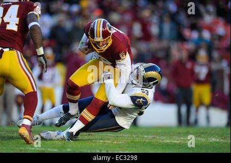 DEC 07, 2014 : Washington Redskins punter Tress Way (5) gets tackled after a failed fake punt and run on fourth down during the matchup between the St. Louis Rams and the Washington Redskins at FedEx Field in Landover, MD. Stock Photo