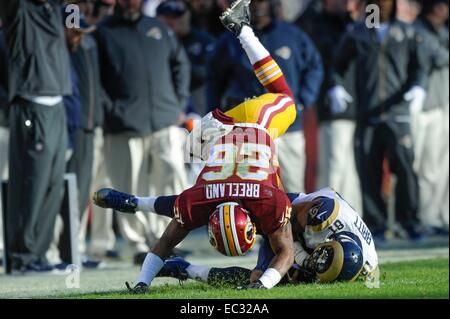 DEC 07, 2014 : Washington Redskins cornerback Bashaud Breeland (26) oddly tackles St. Louis Rams wide receiver Kenny Britt (81) during the matchup between the St. Louis Rams and the Washington Redskins at FedEx Field in Landover, MD. Stock Photo