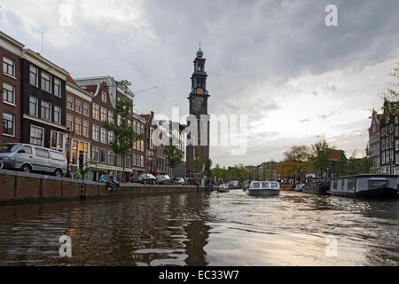 AMSTERDAM - OCTOBER 22, 2013: Canals on October 22, 2013 in Amsterdam. Amsterdam, capital of the Netherlands has more than one h Stock Photo